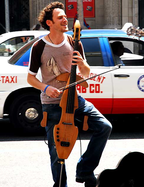 Street musician on Hollywood Boulevard, Friday, August 14, 2009