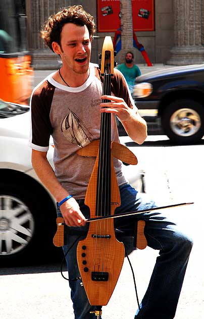 Street musician on Hollywood Boulevard, Friday, August 14, 2009