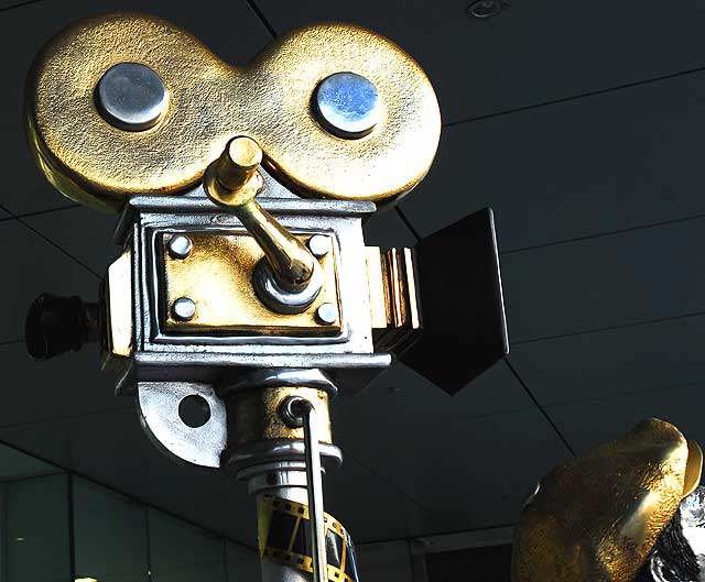 "Going for Gold" by the Israeli sculptor Frank Meisler, Luckman Plaza on the Sunset Strip, West Hollywood