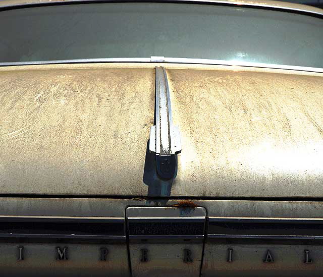 1962 Chrysler Crown Imperial sitting behind a gas station in Malibu