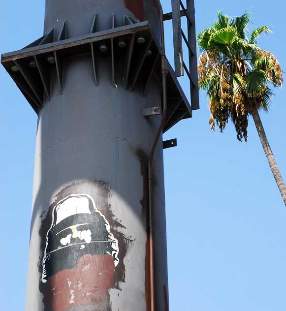Poster on billboard support where Sunset and Hollywood Boulevard cross - Bearded Man
