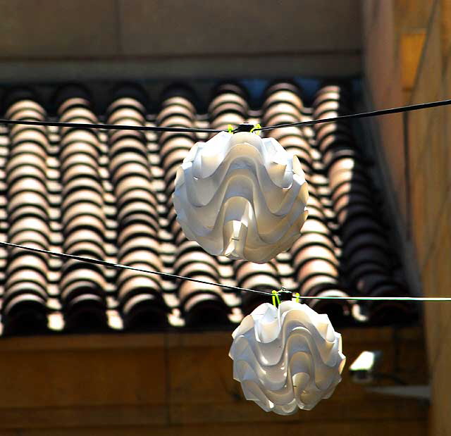 White curled lanterns and red tile roof - courtyard of the Egyptian Theater, 6712 Hollywood Boulevard