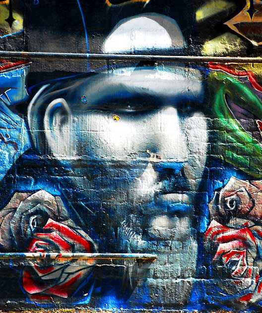 Face at center of "Rest in Power" mural, Melrose Avenue at Fuller