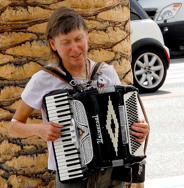 Woman playing Amazing Grace on her Universal Accordion, Hollywood Boulevard