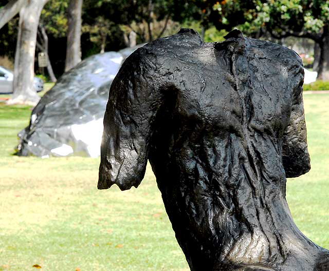 "Sitting Figure on a Short Bench" (2000) by the Polish artist Magdalena Abakanowicz – at Santa Monica Boulevard and Crescent Drive, Beverly Gardens Park, Beverly Hills