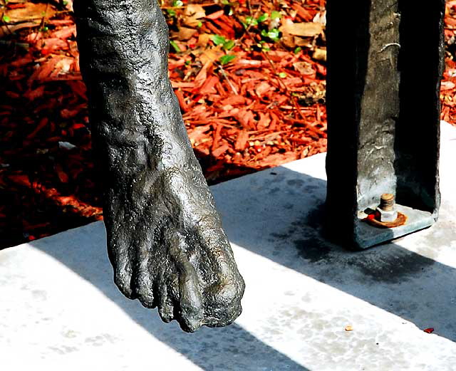 "Sitting Figure on a Short Bench" (2000) by the Polish artist Magdalena Abakanowicz  at Santa Monica Boulevard and Crescent Drive, Beverly Gardens Park, Beverly Hills