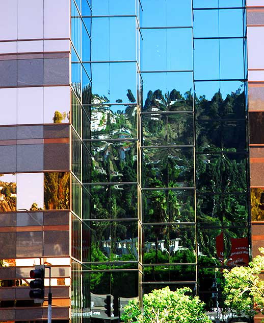 Reflections in glass at the Directors Guild of America building on Sunset Boulevard, at the foot of the Hollywood Hills