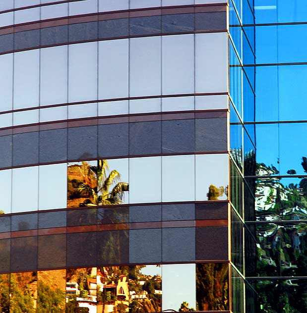 Reflections in glass at the Directors Guild of America building on Sunset Boulevard, at the foot of the Hollywood Hills