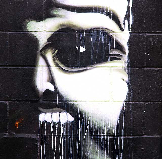 Dripping Face - graffiti in alley behind Melrose Avenue