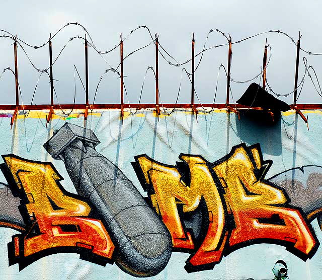 Graffiti Bomb and Razor Wire, alley behind Melrose Avenue