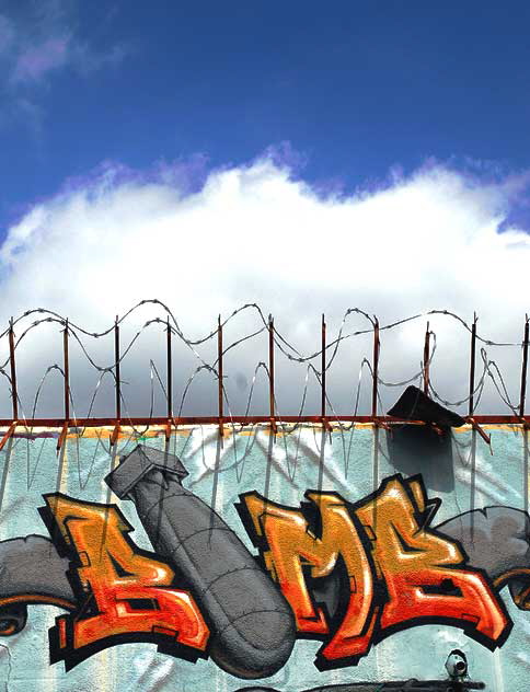 Graffiti Bomb and Razor Wire, alley behind Melrose Avenue