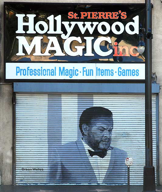 Orson Welles graphic on rollup door, Hollywood Magic, Hollywood Boulevard