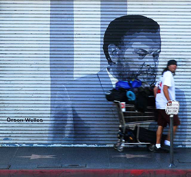 Orson Welles graphic on rollup door, Hollywood Magic, Hollywood Boulevard