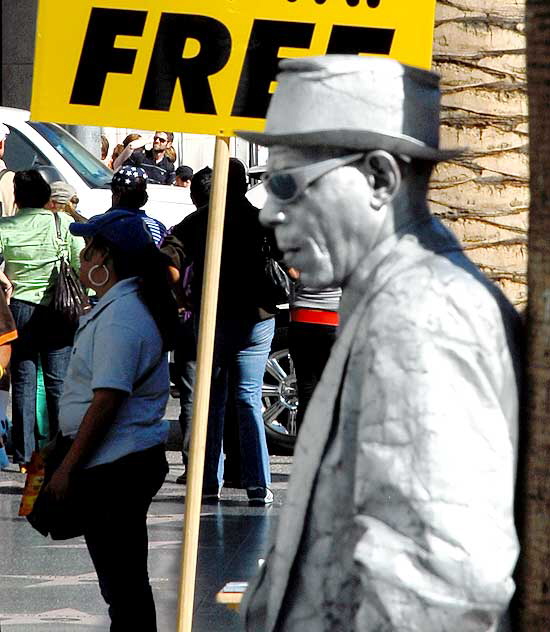 Hollywood Boulevard's "Silver Man" and the crowd at Hollywood and Highland