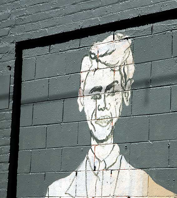 Preliminary work on a Three Kennedy Brothers and Abraham Lincoln mural at Susy's Meat Market (Carniceria Latina), 4605 Santa Monica Boulevard at Madison