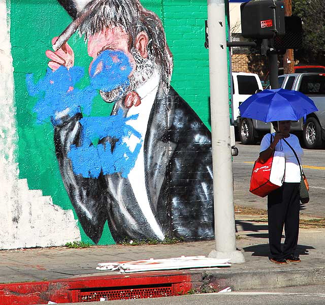 Preliminary work on a Three Kennedy Brothers and Abraham Lincoln mural at Susy's Meat Market (Carniceria Latina), 4605 Santa Monica Boulevard at Madison