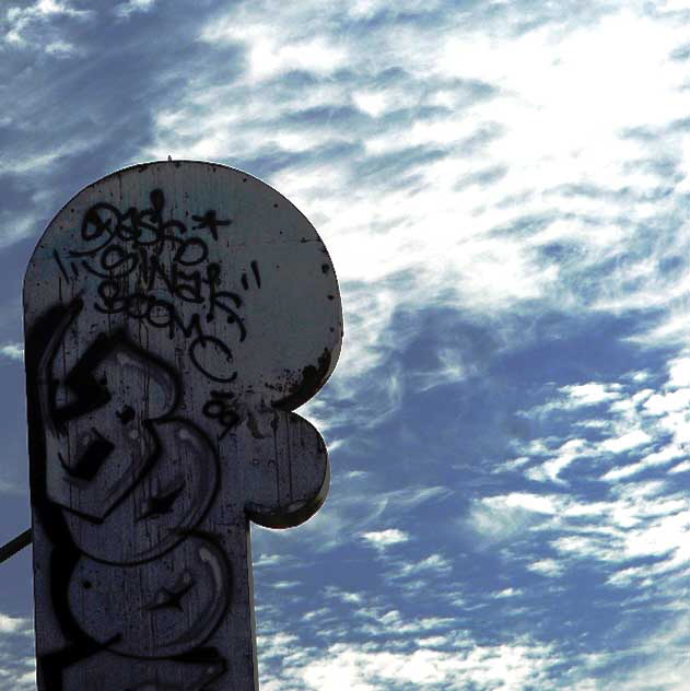 Odd light on a November Monday in Hollywood - graffiti on old marquee, Las Palmas 