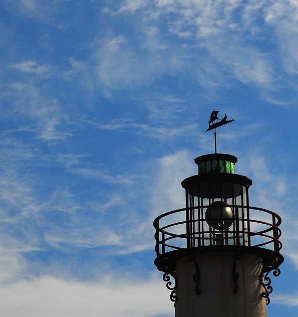 Odd light on a November Monday in Hollywood - mock lighthouse at Crossroads of the World, seen from Las Palmas 