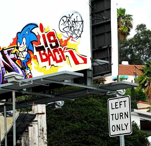 Graffiti-style billboard, Sunset Boulevard at La Cienega