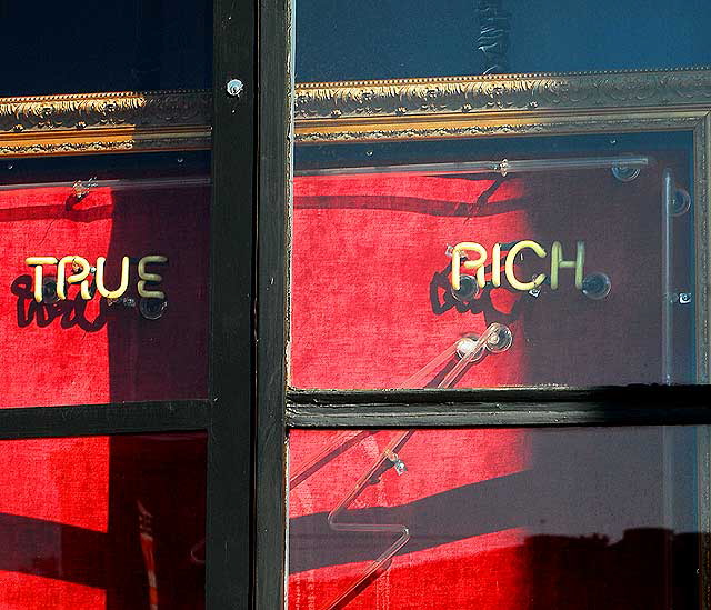 Framed neon sign in window of psychic shop, La Cienega and Oakwood in West Los Angeles