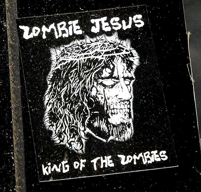 Zombie Jesus sticker, door of tattoo shop, Hollywood Boulevard