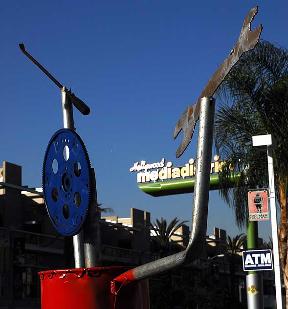 Metal Man - gas station at Melrose and Highland