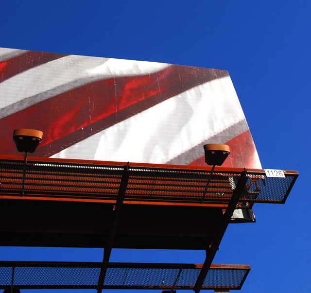 Flag billboard, Melrose and Highland