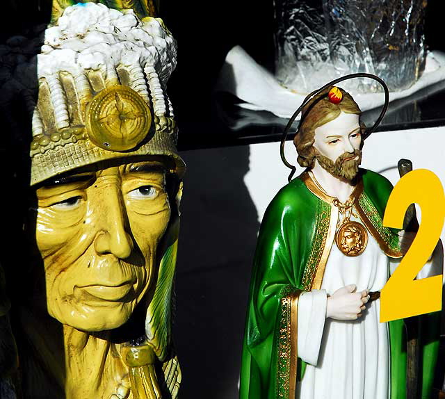 Indian Chief and Jesus, figures in shop window, Sunset Boulevard near Alvarado in Echo Park