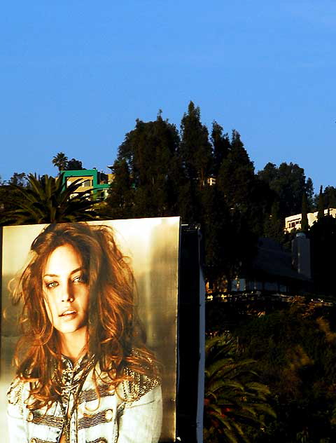 Guess billboard and the Hollywood Hills