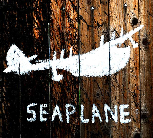 White Seaplane, painting on wooden door