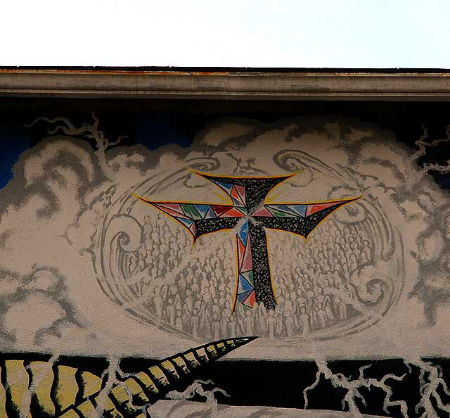 Cross on graffiti wall behind Hebrew school on La Brea at Waring