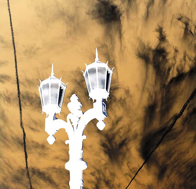 Streetlamp and Odd Clouds, corner of Ivar and Selma, Hollywood - negative print