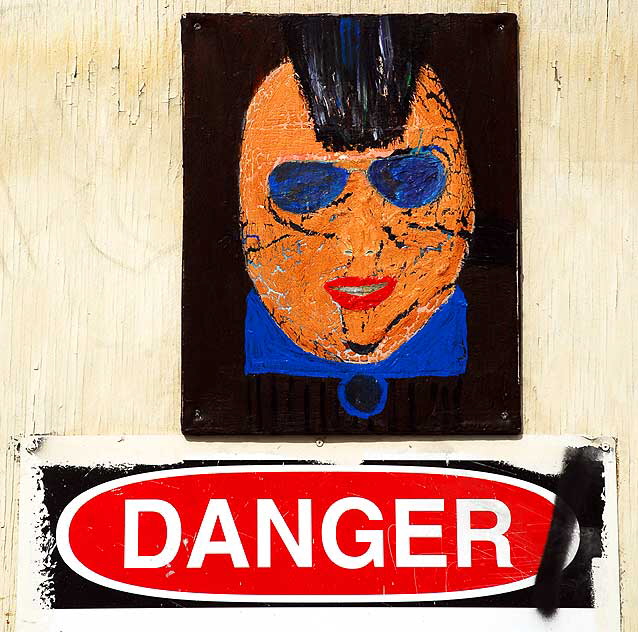 Mohawk, Sunglasses, Danger - warning sign at a construction site where Sunset Boulevard meets the Hollywood Freeway