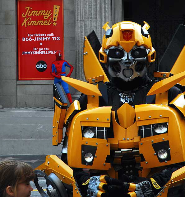 At the El Capitan on New Year's Eve afternoon - a Transformer and Spiderman