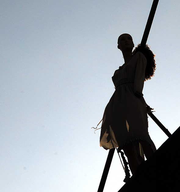 Figure on roof of Community Thrift Store, Fairfax Avenue, Los Angeles