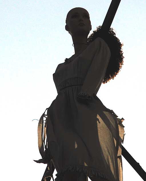 Figure on roof of Community Thrift Store, Fairfax Avenue, Los Angeles