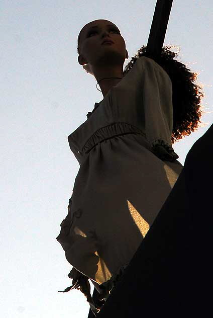 Figure on roof of Community Thrift Store, Fairfax Avenue, Los Angeles