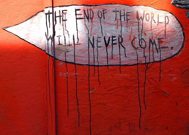 "The End of the World Will Never Come" - orange plywood wall at Heliotrope and Melrose, just south of LA City College