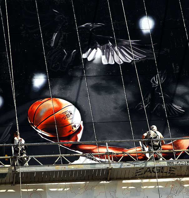 "Basketball" supergraphic being installed over Wilshire Boulevard