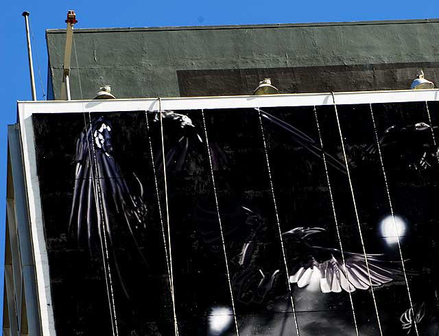 "Basketball" supergraphic being installed over Wilshire Boulevard