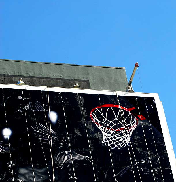 "Basketball" supergraphic being installed over Wilshire Boulevard