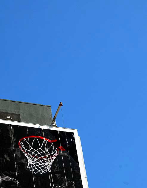 "Basketball" supergraphic being installed over Wilshire Boulevard