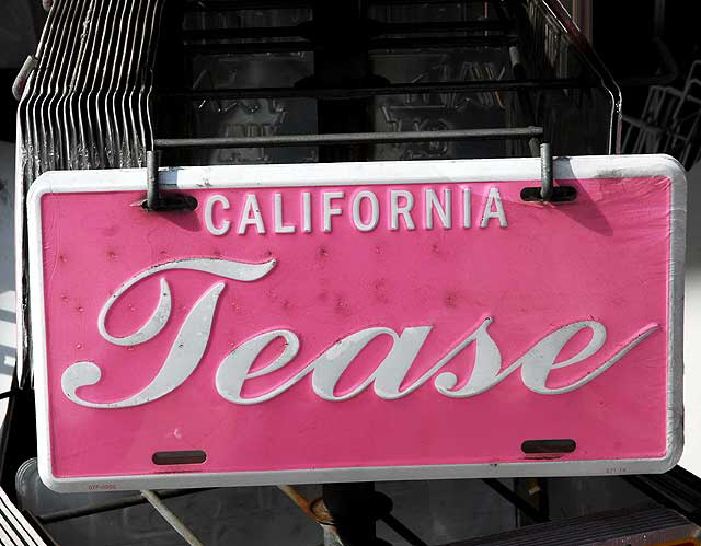 California Tease - license plate for sale at souvenir shop on Hollywood Boulevard