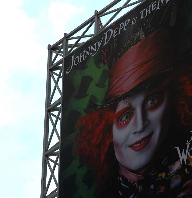 Johnny Depp as the Mad Hatter, billboard above Hollywood Boulevard