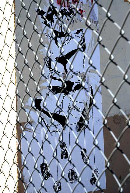 Poster of couple kissing behind chain link fence, Sunset Boulevard and Gordon, Hollywood