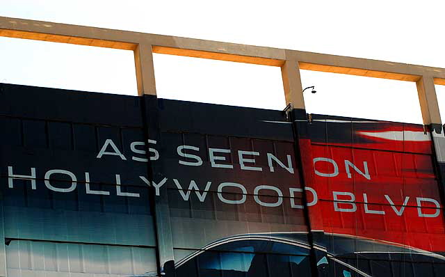 Jaguar supergraphic being installed on the southeast corner of La Brea and Hollywood Boulevard, Friday, March 19, 2010