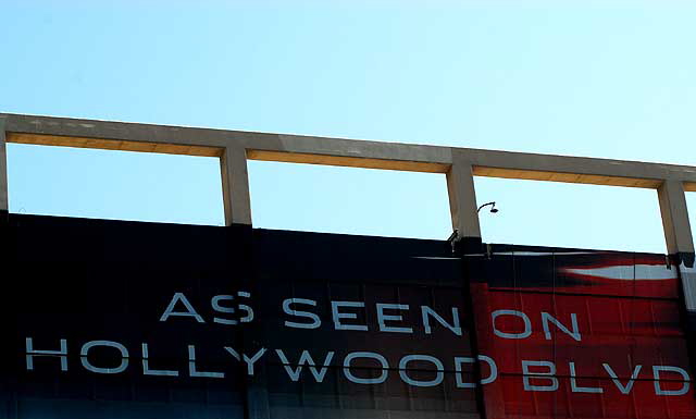 Jaguar supergraphic being installed on the southeast corner of La Brea and Hollywood Boulevard, Friday, March 19, 2010