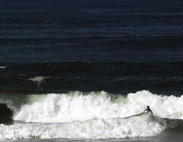 Surfing in Manhattan Beach, Tuesday, March 23, 2010