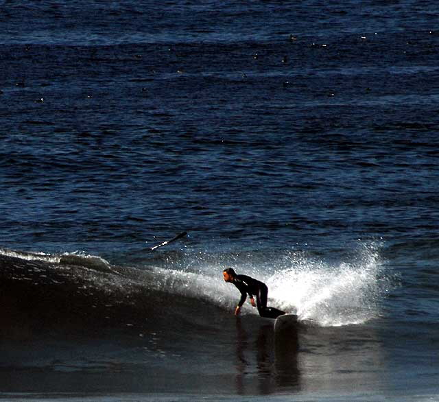 Surfing in Manhattan Beach, Tuesday, March 23, 2010