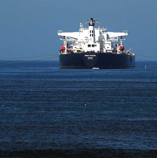 But in between Manhattan Beach and Malibu there are the oil tankers anchored off El Segundo, pumping their loads of Alaskan crude to the big Chevron oil refinery just to the north, by the airport. 